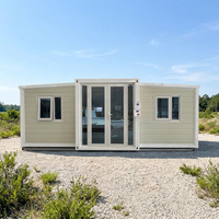 Maison conteneur modulaire en panneaux sandwich d'acier extensible et pliable de 20 pieds, bâtiment portable anti-corrosion et étanche pour salon