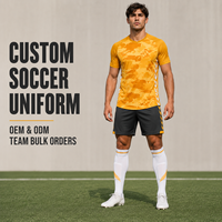 Tenue de football personnalisée camouflage orange, ensemble maillot et short respirant à manches courtes pour l'entraînement quotidien de l'académie de football