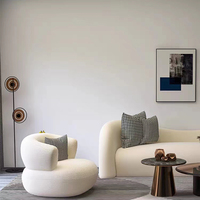 Mobilier élégant pour la maison Chaise ronde avec bras en forme de boucle Chaise de salon moderne en velours pour hôtel Chaise de canapé simple de luxe