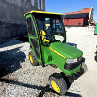 Tracteur de jardin diesel hydrostatique tout-terrain robuste 2006 avec cabine fermée pour la tonte, le remorquage et le déneigement