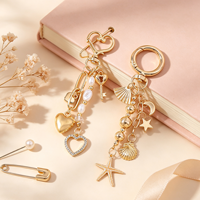 Porte-clés en alliage de zinc avec perles superposées, pendentif cœur, coquillage, étoile et lune plaqué or pour femme, décoration de sac à main