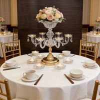 J168 En gros Centre de table floral haut de gamme doré en métal, style lustre, pour décoration de table de mariage et de fête