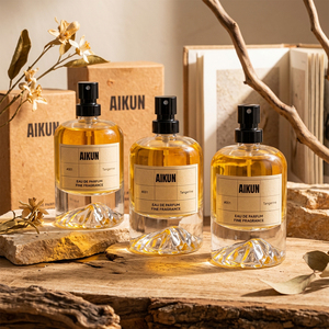 Aikun 100ml Natural Kraft Box Black <b>Atomizer</b> Gold Label Long Lasting Tangerine Fine Fragrance Clear Round Glass Eau De Parfum - Product Image 1