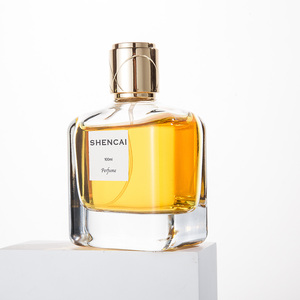 Nuevo Diseño, Fabricante, Botellas de Perfume Vacías de Vidrio de 100 ml, Base Redonda-Rectangular, con Tapa Metálica de <span class=keywords><strong>Zamak</strong></span> - Product Image 1