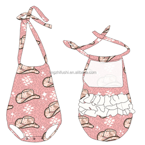 OEM Tùy Chỉnh Bò Cô Gái Không Tay Backless Halter Jumpsuit Thời Trang Phương Tây Quần Áo Bé Bong Bóng Ruffle Mông Rompers - Product Image 2