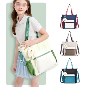 Sac bandoulière personnalisé avec logo d'usine, sac fourre-tout décontracté grande capacité pour enfants, idéal pour <span class=keywords><strong>cours</strong></span> <span class=keywords><strong>de</strong></span> <span class=keywords><strong>soutien</strong></span> <span class=keywords><strong>scolaire</strong></span>, coloré et tendance - Product Image 1