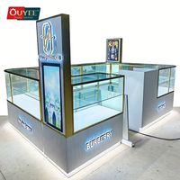 Fournisseur d'usine : Kiosque à parfum de luxe pliable 3D personnalisé avec comptoir d'exposition en verre trempé pour centre commercial