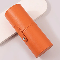 Vente en gros de porte-pinceaux de maquillage en forme de tube rond en cuir PU avec logo personnalisé, coque rigide, portable, pour les voyages