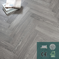 Parquet en bois d'ingénierie à trois couches avec incrustations florales, revêtement de sol personnalisé à motifs européens pour salon et zone de loisirs