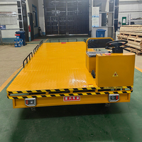 Chariot à plateau électrique robuste de 2 tonnes, plateforme de chargement 4x2m, 5m, 4 roues directionnelles, véhicule de transport industriel pour entrepôt