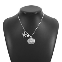 Collier tendance en alliage de zinc style plage avec multiples breloques étoile de mer, coquillage et perles d'imitation pour filles, demoiselles d'honneur, anniversaires et fêtes