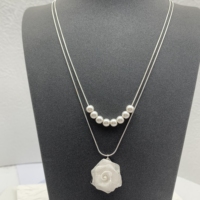 Alta calidad pequeña fragancia viento Camelia serie moda colgante collares al por mayor