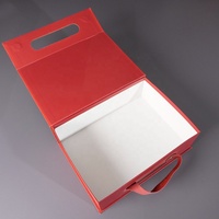 Boîte cadeau pliante en carton noir de luxe sur mesure, fermeture magnétique, doublure en éponge, laminage mat, gaufrage, matériaux recyclés