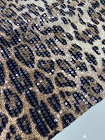 Vente en gros Offre Spéciale stretch imprimé spandex transparent paillettes tissu brodé léopard pour robe