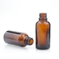 Emballage rond personnalisé de luxe pour soins de la peau Flacon compte-gouttes en verre ambré de 5ml 10ml 15ml 30ml 50ml 100ml d'huile essentielle