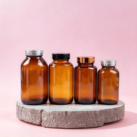 Bouteille de capsule en verre brun de 150ml pour produits de soins de santé Bouteille vide de forme plate étanche à la lumière avec bouchon à vis