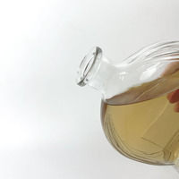 Approvisionnement d'usine Bouteilles en verre de vin rondes plates Base lourde 500ml Bouteille en verre vide de boisson alcool whisky vodka liqueur avec liège