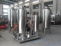 Machine d'emballage automatique 2000BPH PET bouteille 200ml UHT lait pasteurisé jus de fruits Machine d'application d'eau engrenage PLC 500ml