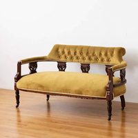 Fauteuil de salon double en velours de style vintage français, en bois massif, avec dossier à boucles, idéal pour la photographie
