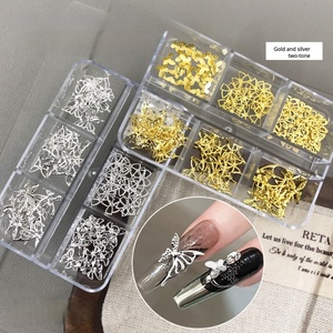 Venta al por mayor de la nueva joyería de uñas con diseño de mariposa hueca de 6 rejillas, decoración de uñas tridimensional DIY en oro y plata. - Product Image 3