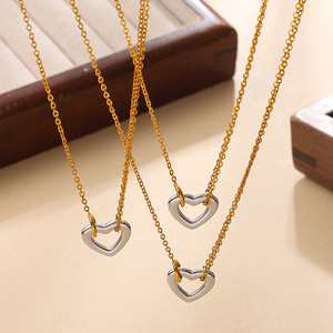 Collar de cadena fina de acero inoxidable con diseño de corazón hueco en contraste de color estilo coreano, delicado, versátil, elegante para el día a día, para mujer - Product Image 1