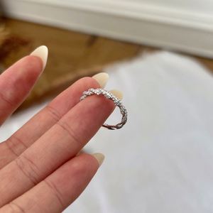 Dylam Exclusive Design High Jewel Rhodium Plated <b>925</b> Sterling <b>Silver</b> 0.245ct D VVS1 Moissanite Twisted Interlock Band <b>Rings</b> - Product Image 5