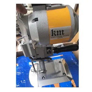 Kullanılan yüksek kalite KM kumaş uç kesici elektrikli düz bıçak kumaş kesme makinesi giyim konfeksiyon endüstriyel kesme makinesi