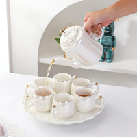 Service à thé en céramique blanc nacré de luxe léger et haut de gamme pour la maison et le salon, avec bouilloire et couvercle de tasse