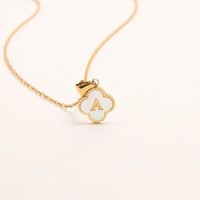 Nouveau Collier Pendentif Lettre Trèfle à Quatre Feuilles en Acier Inoxydable Plaqué Or 18K, Motif Bambou, Design Végétal, Élégant et Polyvalent, pour l'Exportation