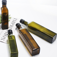 Bouteille en verre vide pour huile d'olive avec bouchon 250ml 500ml 750ml 1000ml Carré transparent Couleur et logo personnalisés pour huile d'olive Bonbons et chocolat
