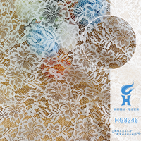 Tissu en dentelle brodée multicolore 100 % polyester de marque HG avec motif floral ajouré pour robe de soirée
