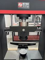 Máquina de Ensayo Electrohidráulica Servocontrolada por Microcomputadora para Pruebas de Compresión y Flexión de Bordillos en Forma de L