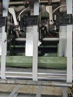 Machine automatique de fabrication de bandes élastiques en polyester à ruban étroit pour l'industrie textile