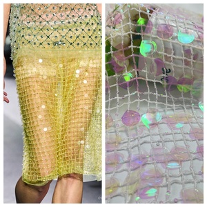 Fabricant de tissus de broderie de paillettes de dentelle de tulle creux de luxe Flash magique pour robe de style européen et français - Product Image 1