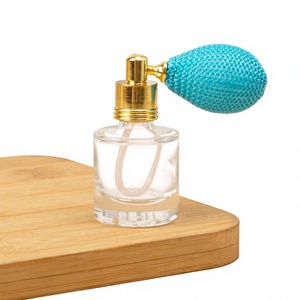 Botella de perfume redonda de vidrio de 10 ml personalizada con diseño de bomba de spray dorada y botella con airbag perlado. - Product Image 1