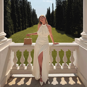 Стильное Белое Атласное Платье-макси с вырезом на шее и открытой спиной, с высоким разрезом - Product Image 1