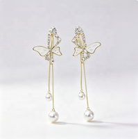 Boucles d'oreilles pendantes tendance en alliage avec fleurs, perles simulées, style bohème, longues, pour femme, bijoux de fête et de vacances