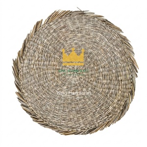 Set de table rond en jonc de mer écologique, fait main, tissé, avec un design bohème pour la décoration de la cuisine et de la salle à manger - Product Image 1