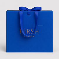 Sacs en papier personnalisés de luxe bleu et or pour cosmétiques, vêtements et emballages – Sacs shopping sur mesure pour l'habillement