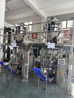 Machine d'emballage verticale automatique multi-têtes pour le remplissage de sacs de 500g, 1kg, 2kg pour aliments granulés et matériaux plastiques