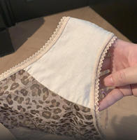 Nouveau style 2026 – Culotte string taille basse pour femme en gaze noire, imprimé léopard séduisant, dentelle sexy, respirante, coton-polyester
