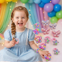 En gros : Accessoires de cheveux faits main : Élastiques à cheveux en perles, papillons, cordes à cheveux en forme de cœur, élastiques à cheveux en forme d'étoiles avec strass