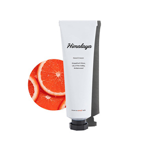 Crema de Manos Humectante y Calmante con Aroma a Pomelo, con Manteca de Karité y Ácido Hialurónico para Reparación y Protección - Product Image 1