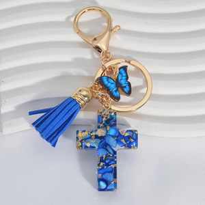 Porte-clés Croix Chrétienne en Résine Bleu/Violet/Rose avec Breloque Papillon et Pompon – Décoration Suspendue Élégante pour Hommes et Femmes – Vente Flash - Product Image 2