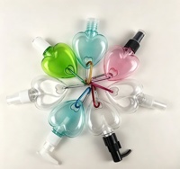 Porte-clés – Flacon transparent en plastique de 50 ml en forme de feuille ou de cœur pour parfum, désinfectant pour les mains, cosmétiques, avec crochet métallique