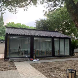 Maison conteneur modulaire préfabriquée isolée de haute qualité à plancher plat panneau sandwich pour usage scolaire de bureau préfabriqué - Product Image 4