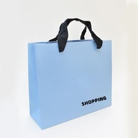 Vente en gros de sacs à provisions de luxe en papier avec logo de marque propre personnalisés pour la protection de l'environnement