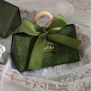 Kotak kemasan tas kertas bentuk segitiga besar dengan pegangan kotak permen pernikahan kotak hadiah permen pernikahan untuk tamu