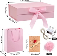 Boîte cadeau écologique rose en carton avec couvercle, nœud, sac, ruban, lumière LED, raphia, doublure en éponge, paillettes, pliable, gaufrage, mariages