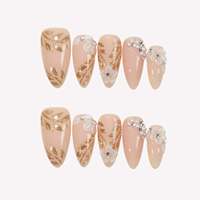 Faux ongles à presser en acrylique, forme amande, longueur moyenne, motif floral doré à la française, branche peinte or, design perle, accents strass